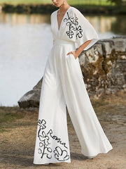 Flower Print Pleated Pockets Half Sleeves High Waisted Deep V-Neck Jumpsuits